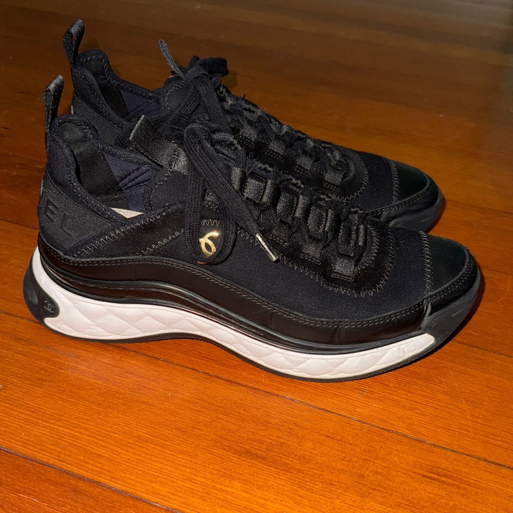 Women's Chanel black sneakers
